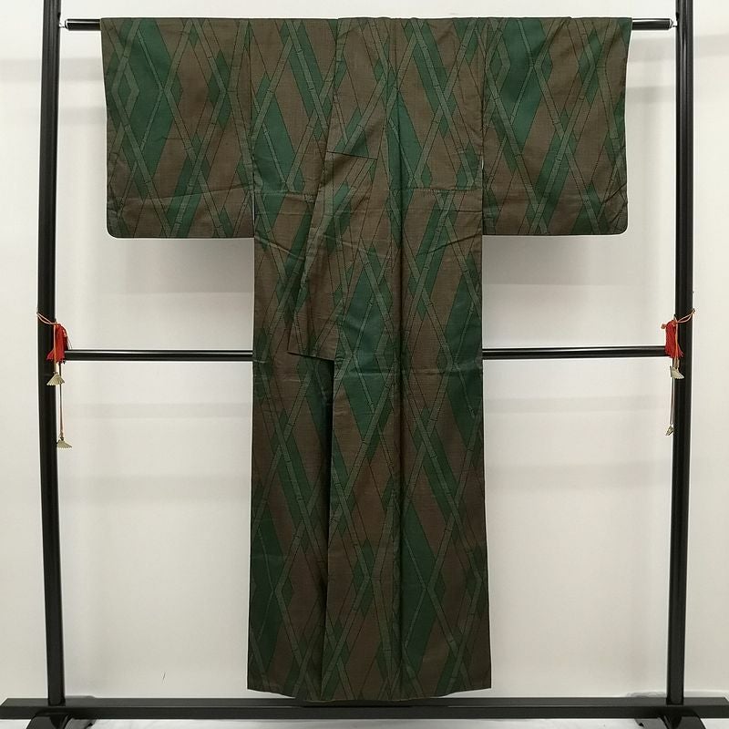 織柄紬 正絹 良品 緑・うぐいす色地に木の葉・植物柄_画像2