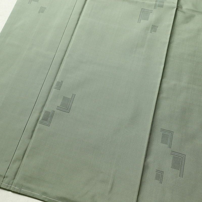 大島紬 美品 色泥染 証紙あり しつけ糸付き 正絹 幾何学柄・抽象柄 袷仕立て 身丈153.5cm 裄丈64.5cm 緑・うぐいす色_画像4