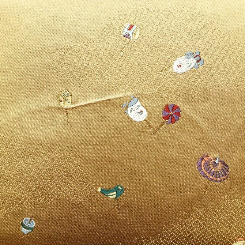 袋帯 六通柄 正絹 古典柄 刺繍 独楽 傘 黄・黄土色_画像2