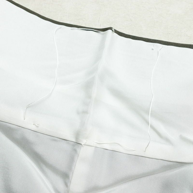 付け下げ 良品 作家物 落款入り しつけ糸付き 縮緬 一つ紋付き 正絹 幾何学柄・抽象柄 袷仕立て 身丈156.5cm 裄丈67.5cm 刺繍 緑・うぐいす色_画像19