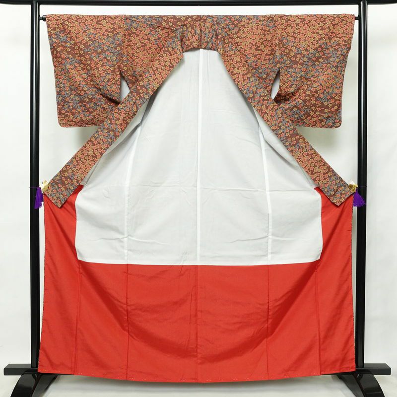 小紋 美品 縮緬 しつけ糸付き ポリエステル 花柄 袷仕立て 身丈164cm 裄丈66.5cm 茶_画像3