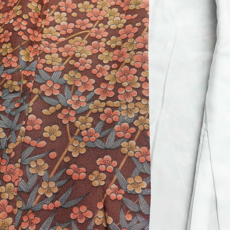 小紋 美品 縮緬 しつけ糸付き ポリエステル 花柄 袷仕立て 身丈164cm 裄丈66.5cm 茶_画像16