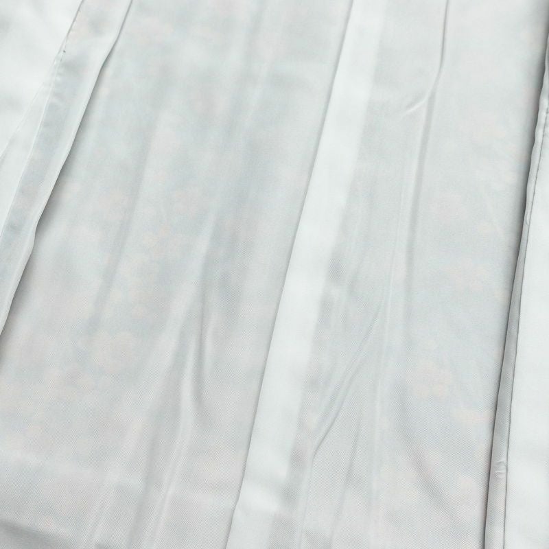 小紋 美品 縮緬 しつけ糸付き ポリエステル 花柄 袷仕立て 身丈164cm 裄丈66.5cm 茶_画像17