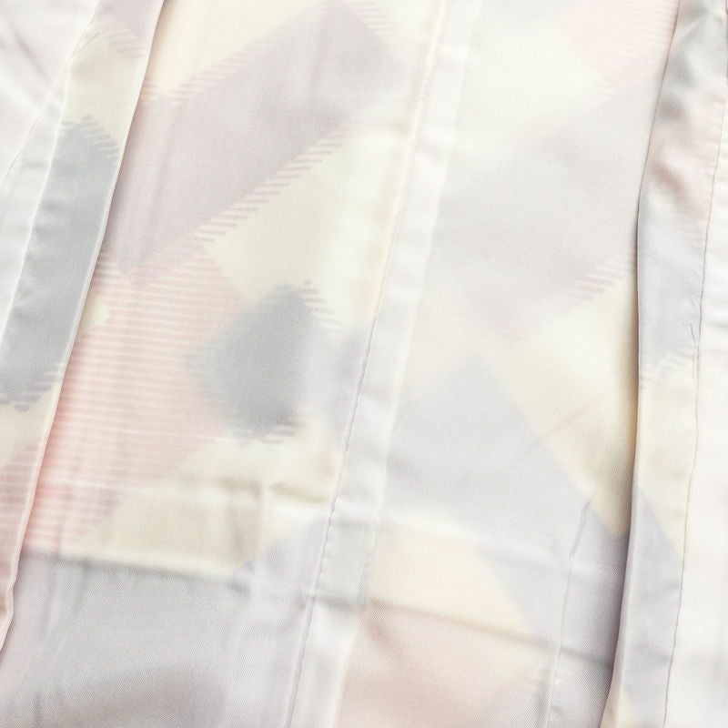 二尺袖・小振袖 美品 しつけ糸付き ポリエステル 幾何学柄・抽象柄 袷仕立て 身丈113cm 裄丈68.5cm クリーム_画像15