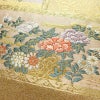 名古屋帯 太鼓柄 落款入り 正絹 木の葉・植物柄 名古屋仕立て 箔 金糸 帯 黄・黄土色_画像3