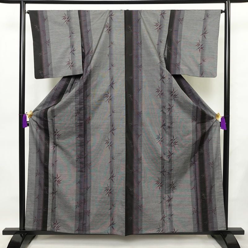 本場大島紬 伝統工芸品 単衣 美品 証紙あり 正絹 木の葉・植物柄 単衣仕立て 身丈159.5cm 裄丈65cm さが美 着物 紫・藤色_画像1