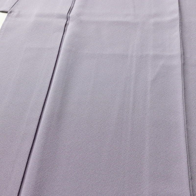 色無地 美品 本場奄美大島泥染 伝統染色 色泥染 証紙あり 丹後ちりめん しつけ糸付き 縮緬 一つ紋付き 正絹 無地 袷仕立て 身丈160cm 裄丈64.5cm 共八掛 フォーマル 着物 お茶会 紫・藤色_画像5