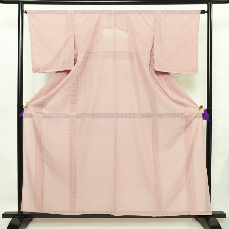 盛夏 色無地 しつけ糸付き 一つ紋付き ポリエステル その他の柄 単衣仕立て 身丈158cm 裄丈64.5cm リサイクル着物 着物 薄物 ピンク_画像1