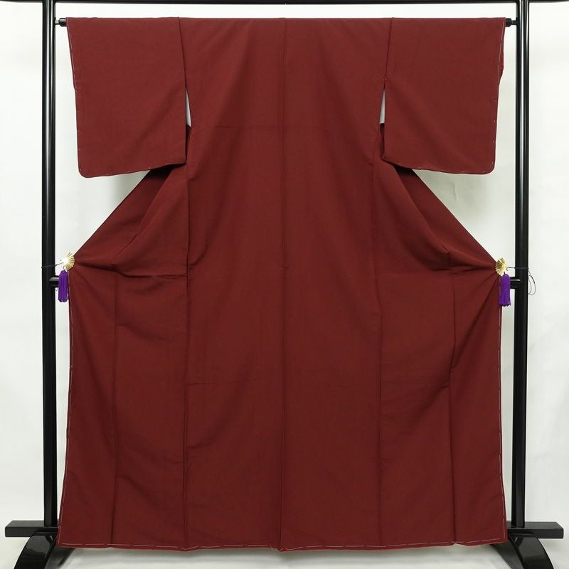 色無地 しつけ糸付き ポリエステル 無地 袷仕立て 身丈163.5cm 裄丈65cm リサイクル着物 着物 小豆・エンジ_画像1