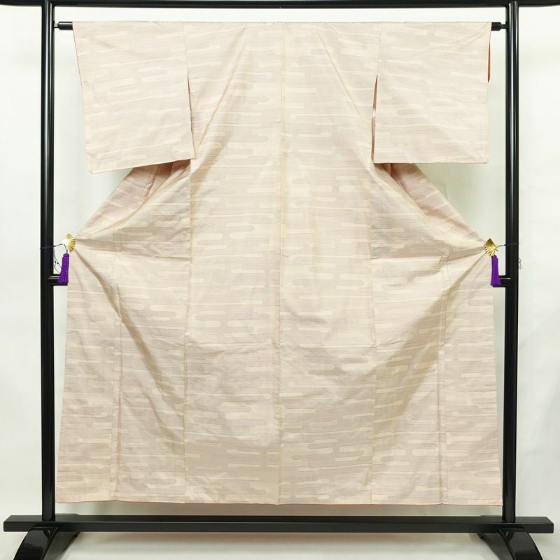 大島紬 都喜ヱ門 手絣 証紙あり 正絹 古典柄 袷仕立て 身丈154cm 裄丈62.5cm リサイクル着物 一部しつけ糸付き 着物 ベージュピンク ピンク_画像1