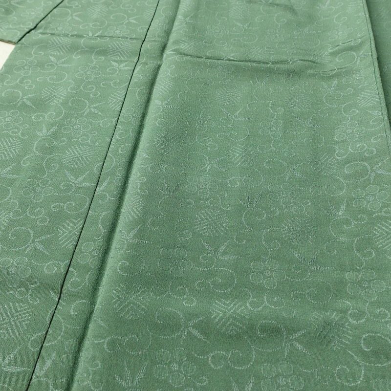 単衣 色無地 しつけ糸付き 一つ紋付き 正絹 古典柄 単衣仕立て 身丈158cm 裄丈63cm リサイクル着物 着物 緑・うぐいす色_画像5