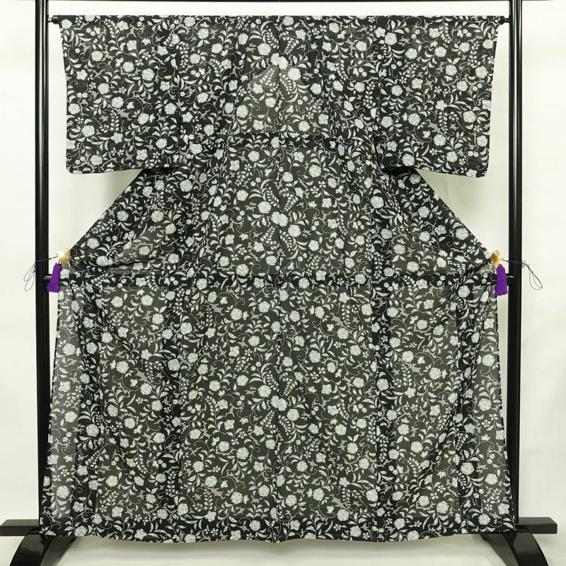 盛夏 小紋 美品 ポリエステル 花柄 単衣仕立て 身丈161.5cm 裄丈65cm リサイクル着物 着物 黒_画像1