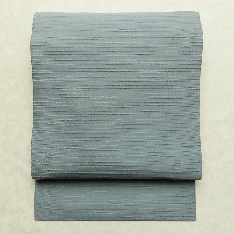 名古屋帯 全通柄 良品 正絹 名古屋仕立て なごや帯 リサイクル帯 帯 紬地 くすみブルー 青・紺_画像1